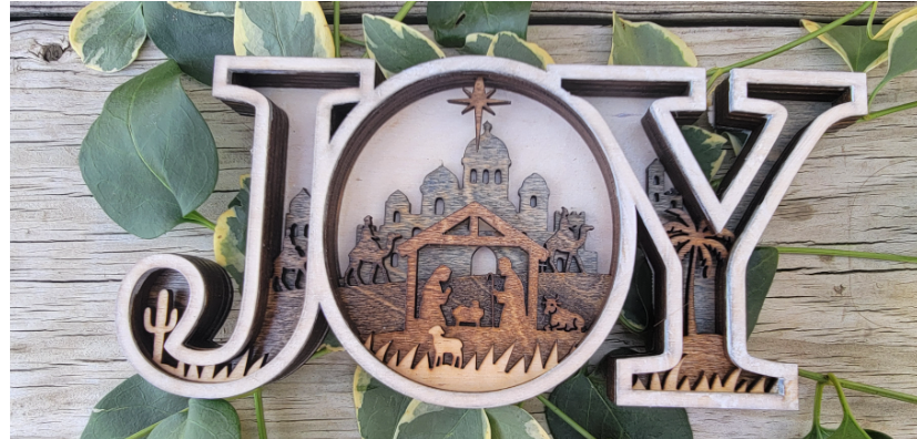 Unwrap the Spirit of Christmas with Our Multi-Layered JOY Sign!